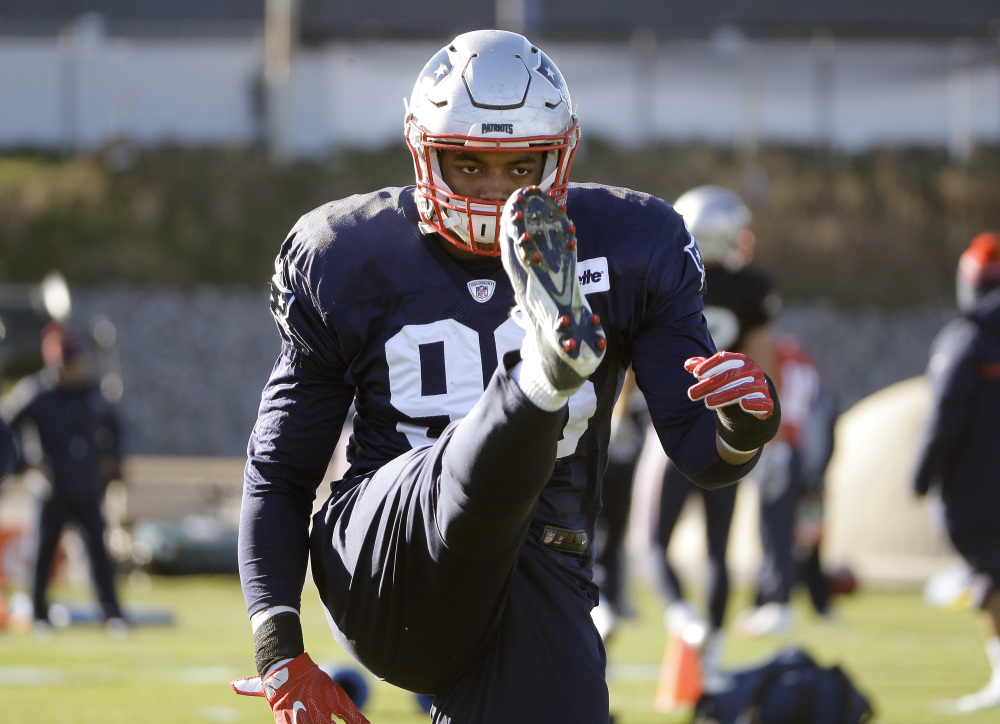 New England defensive end Trey Flowers warms up during a practice Wednesday in Foxborough, Massachusetts.