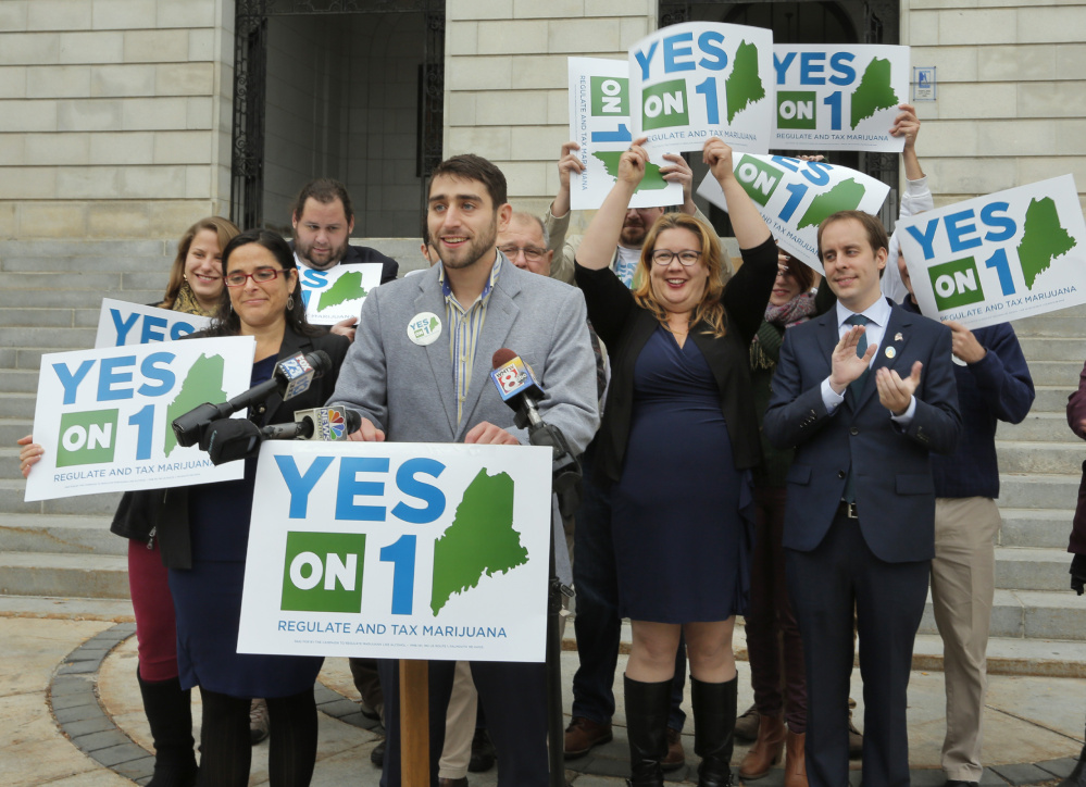 Proponents of the marijuana legalization referendum claim victory Nov. 9 at a news conference at City Hall in Portland.