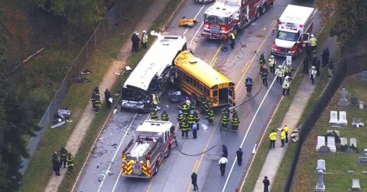 Emergency personnel work at the scene of a fatal bus crash in Baltimore on Tuesday.