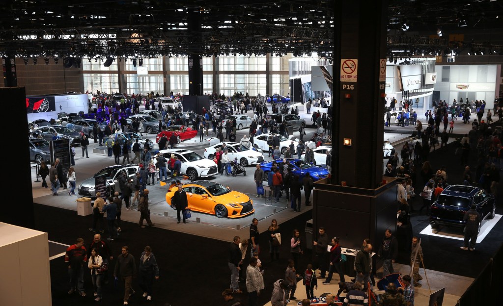 Thousands of people flock to see the new car models at the Chicago Auto Show in February.