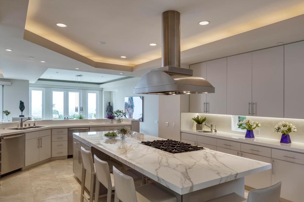 In the kitchen, marble should be used with caution on high-traffic surfaces like countertops.