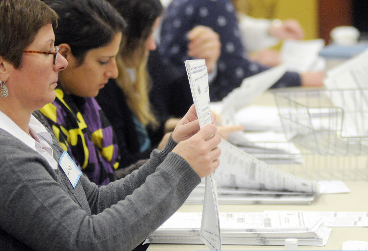 The hand recount of the marijuana referendum results began Dec. 5 at the Department of Public Safety in Augusta. The recount was suspended late Thursday, after about 30 percent of the ballots cast had been reviewed with no significant change in the totals.
