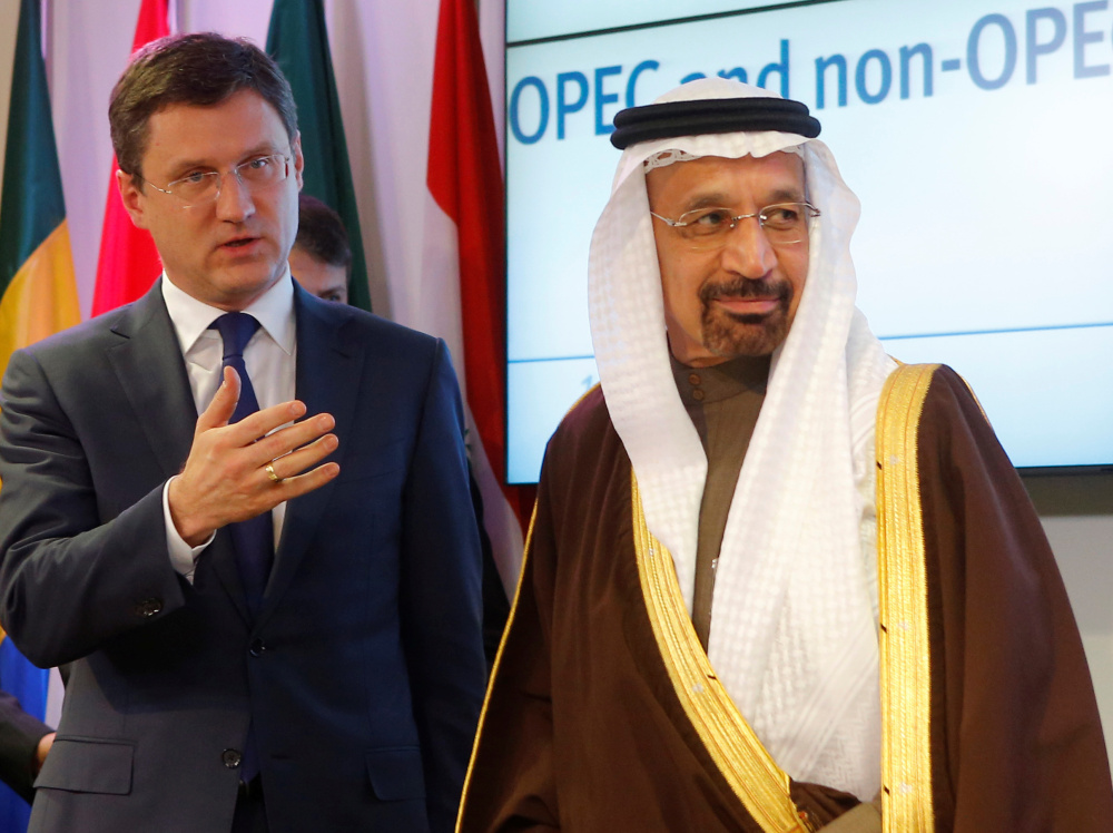 Russia's energy minister, Alexander Novak, and Saudi Arabia's energy minister, Khalid al-Falih, leave a news conference after an OPEC meeting in Vienna, Austria on Saturday.