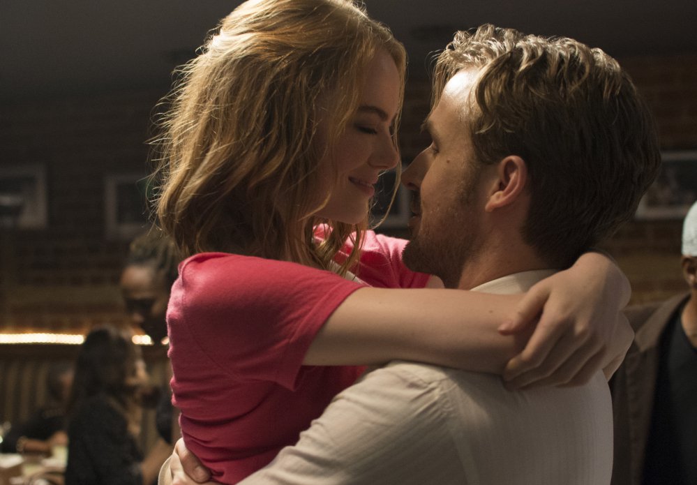 Ryan Gosling, right, and Emma Stone in a scene from, "La La Land." The film was nominated for a Golden Globe award for best motion picture musical or comedy.