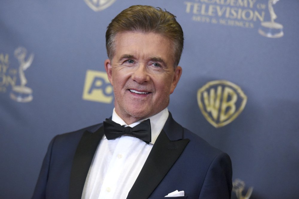 Alan Thicke poses at the 2015 Daytime Emmy Awards in Burbank, Calif. Thicke died Tuesday at the age of 69.