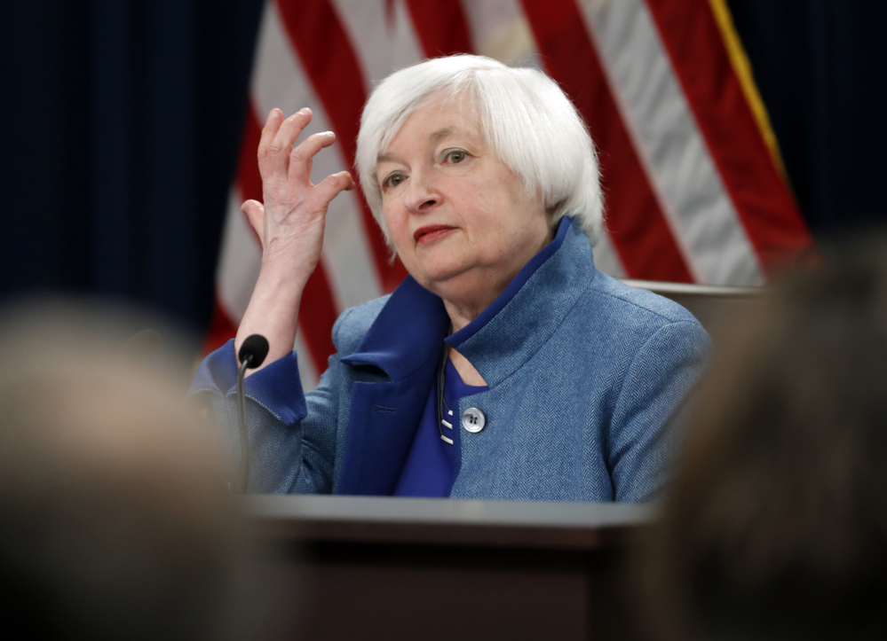 Federal Reserve Board Chair Janet Yellen listens to a reporter's question during a news conference about the Federal Reserve's monetary policy on Wednesday in Washington.