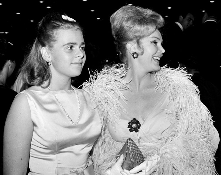 Zsa Zsa Gabor and her daughter, Francesca Hilton, arrive for a premiere in Hollywood in 1963.