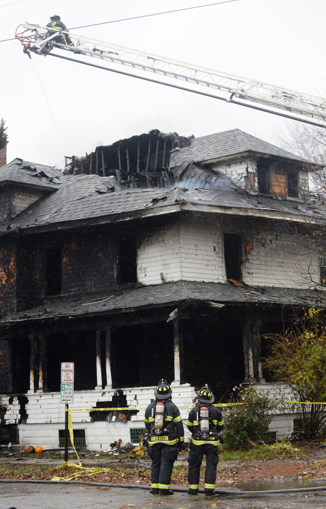 The size of the third-floor windows in a deadly Nov. 1, 2014, fire at a Noyes Street apartment building, above, became a focus in the trial of landlord Gregory Nisbet. He was acquitted of manslaughter but found guilty of a code violation, sentenced to 90 days in jail and fined $1,000. Now Nisbet's lawyer is asking for a new trial, citing evidence he recently learned about.