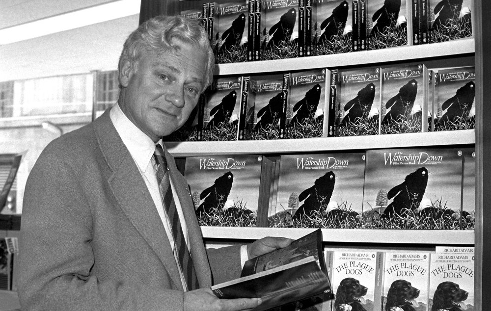 FILE - In this Oct. 18, 1978 file photo author Richard Adams poses for a photograph.  The daughter of British author Richard Adams, whose 1972 book "Watership Down" became a classic of children's literature, says her father has died at age 96. Juliet Johnson told The Associated Press on Tuesday, Dec. 27, 2016 that Adams died on Christmas Eve. (PA Photo via AP)
