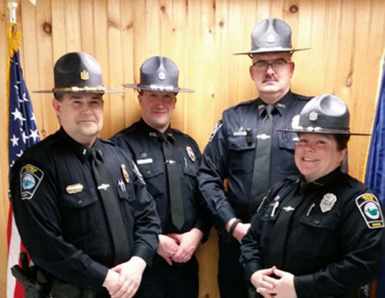 This image from the town of Dixfield's website shows members of the police department. 