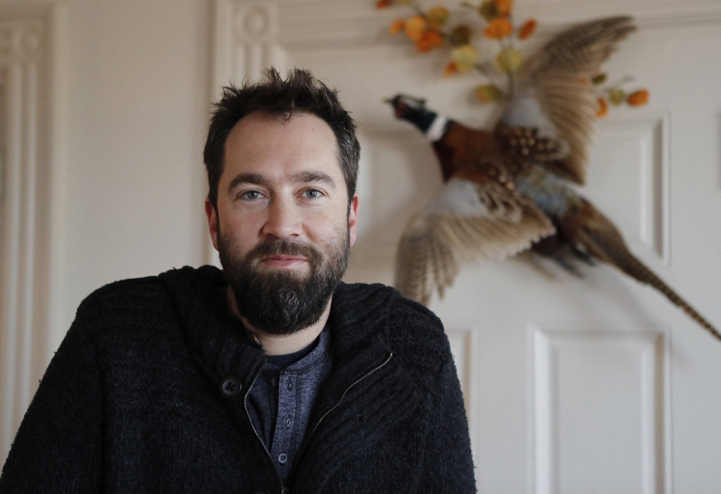 Lucas St. Clair, seen Dec. 13 at his office in Portland, points out that "if the monument gets 5 percent of the visitors that are coming to Acadia, that’s 150,000 people a year."  Joel Page/Staff Photographer