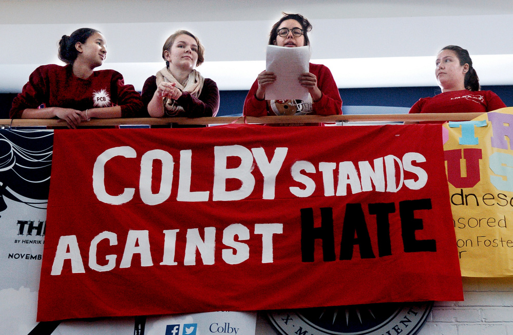 In this 2016 file photo, Colby College students address 300 students and staff who assembled in Cotter Union before marching on campus in Waterville in a protest against hate and against immigration policies proposed by then-President-elect Donald Trump.