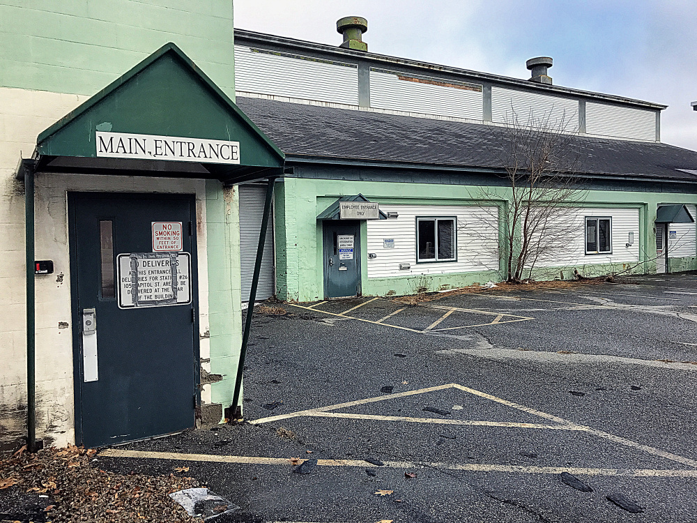 The former Fleet Services Building on Capitol Street in Augusta, shown in this Thursday photo, would be torn down and replaced with a new state office building under a proposal currently being considered by the Maine Department of Administrative and Financial Services.