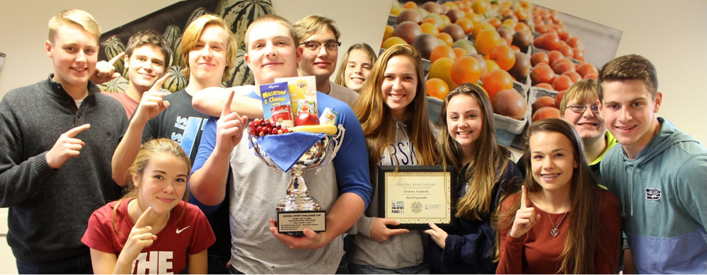 Erskine Academy students hold the School Spirit Challenge Cup, front from left, Morgan Presby, Nicole Taylor and Dylan Keller; middle, from left, Matt Stultz, Russ Sugg, Jake Peavey, Liz Sugg and Parker King, and back, from left, Scott Christainsen, Cody Daignault, Brady Studley and Chris Wight.