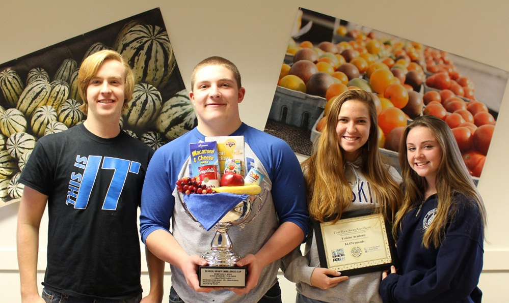 Erskine Academy clas officers who who attended the finale and were presented the cup at the WGME studio in Portland, from left, are Russ Sugg, senior; Jake Peavey, junior;  Elizabeth Sugg, sophomore;  and Parker King, freshman.