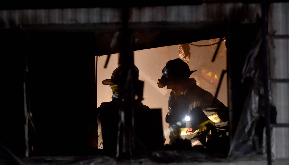 Firefighters from Skowhegan, Canaan and Madison fire departments fought a mobile home fire Friday on North Avenue in Skowhegan.