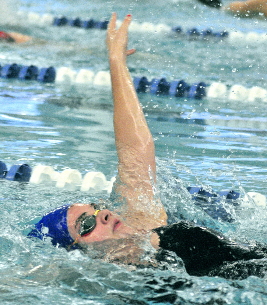 Cony sophomore Gabby Low works on her backstroke during a practice on Nov. 29. at the Kennebec Valley YMCA.