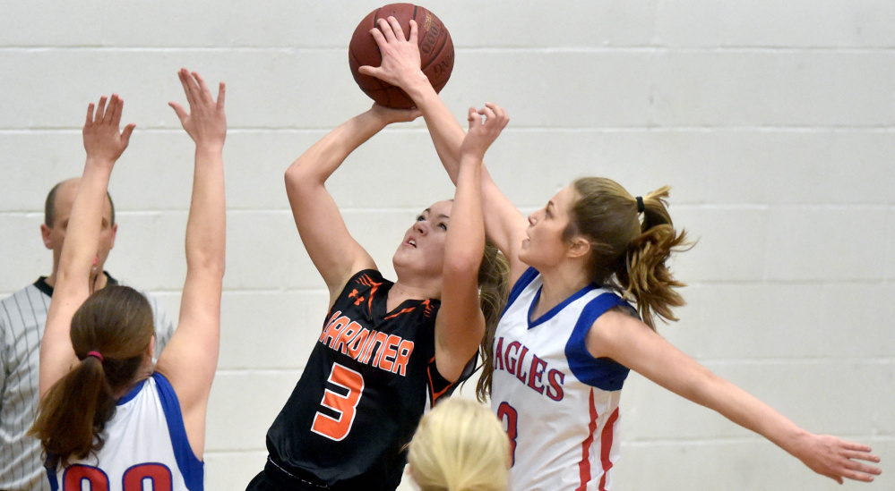 Messalonskee guard Sophie Holmes, right, blocks a shot by Gardner's Mikayla Bourassa during a Kennebec Valley Athletic Conference Class A game last season in Oakland. Holmes and Bourassa return to help lead their respective teams.