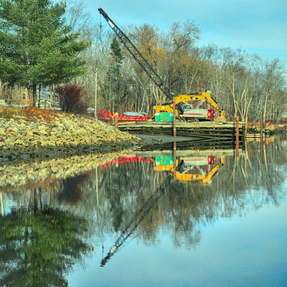 Work has begun on the parking lot for the dock at Steve Powell Wildlife Management Area on Thursday in Richmond. The ferry boat to Swan Island uses the shorefront lot near downtown Richmond.