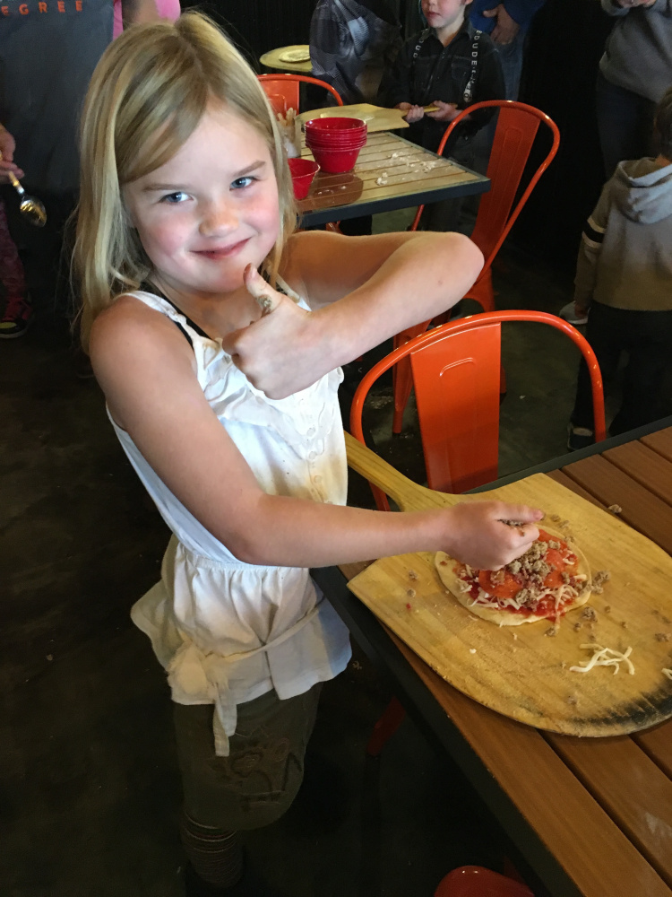 Isabelle Harrington, was one of 18 kids from the Waterville area, who learned the art of pizza making through hands-on experience called Pizza School. The Pizza Degree, a new restaurant in Waterville, hosted the Nov. 6 program.
