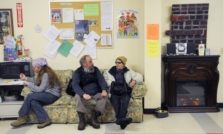 Guests socialize Thursday at the Augusta Community Warming Center in Augusta, which is run by the United Way of Kennebec Valley.