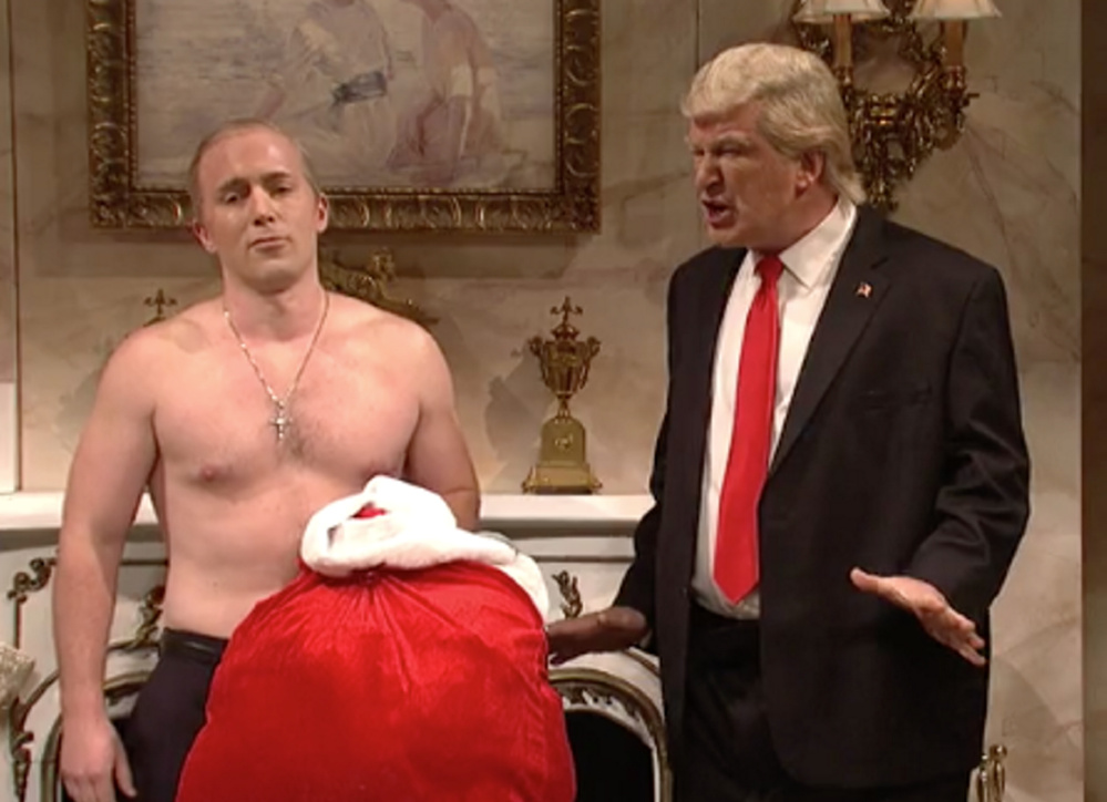 Alec Baldwin as Donald Trump is paid a visit by a shirtless Vladimir Putin on "SNL's" cold open on Saturday night.