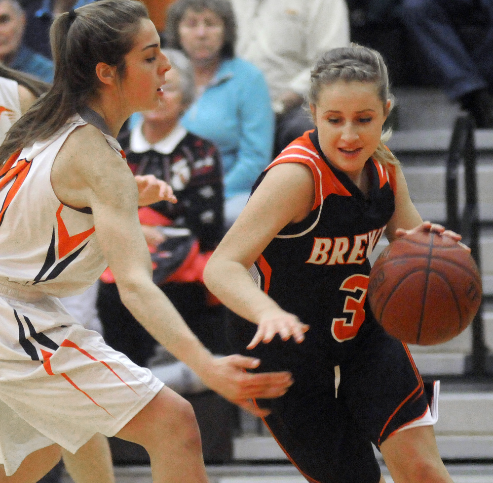 Gardiner's Mary Toman, left, guards Brewer's Ellie Horr during a Class A North game Wednesday in Gardiner.