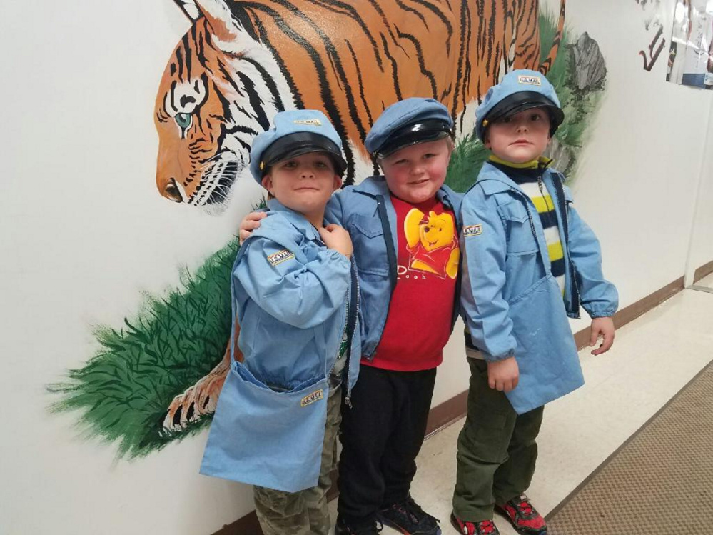 Kindergarten students, from left, Remington Worster, Jacob Baker and Rory Danforth working in Kinder Express Post Office.