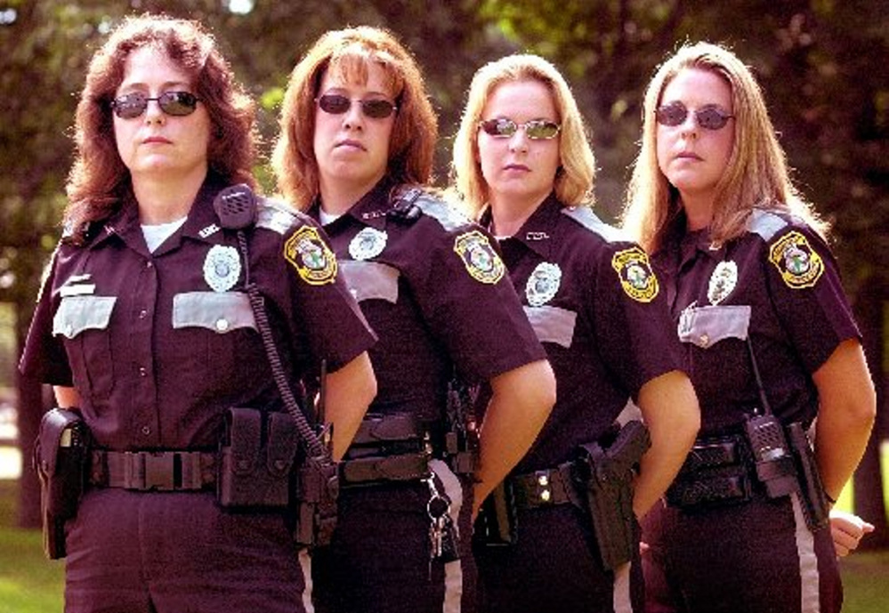 During the early 2000s, Kelly Hooper, far right, worked with three other female police officers in the Fairfield Police Department: from left, Karen Pomelow, Amie Trahan and Shanna Messer.