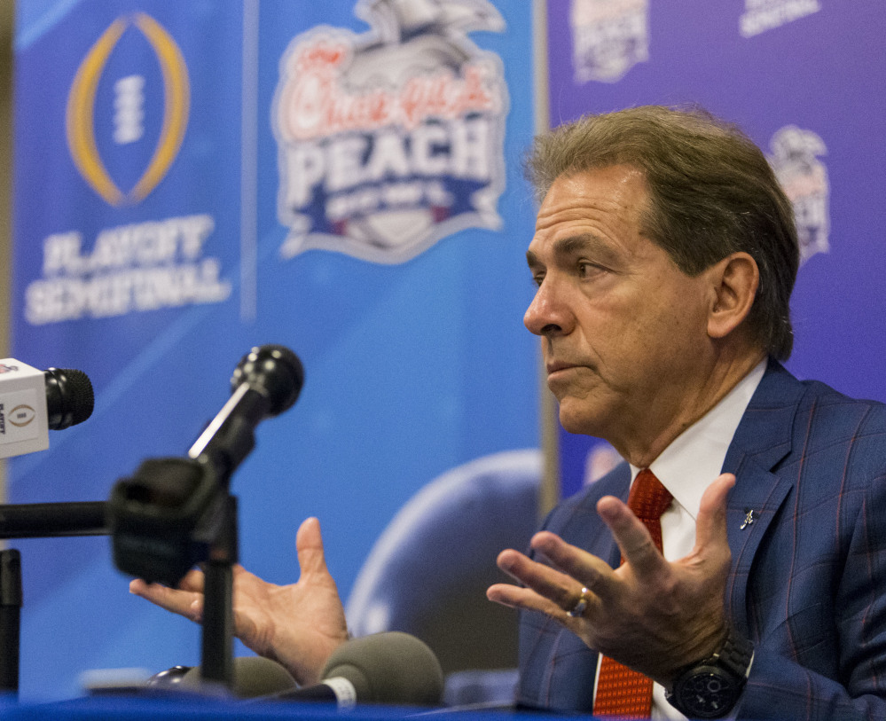 Alabama football coach Nick Saban talks with the media during a Peach Bowl press conference Monday in Atlanta. Alabama takes on Washington on Saturday.