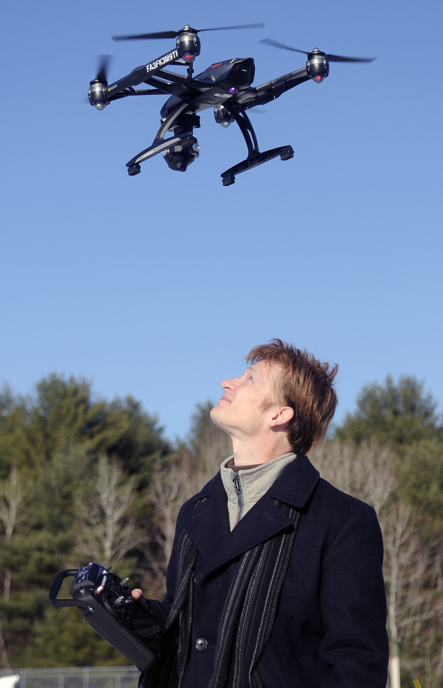Photographer Thomas-john Veilleux operates a drone last week in Augusta.