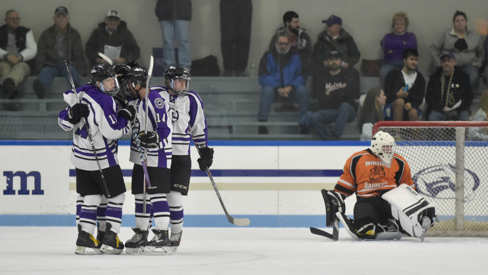 Waterville celebrates a first period goal against Winslow on Tuesday at Colby College in Waterville.