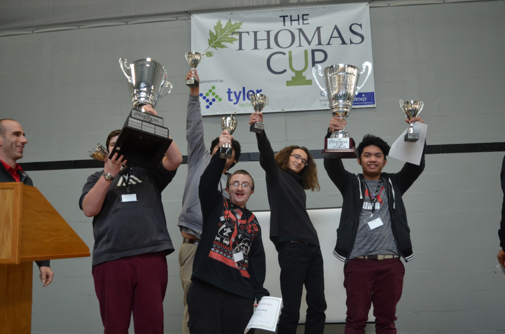 A group of students from Portland's Baxter Academy for Technology and Science won the Thomas Cup, Thomas College's IT and gaming competition that took place on Dec. 2-3. The winners front, from left, were Walter Backman, behind cup; Caleb Marston, Julian Bernard and Antonio Custodio. John Zarate is in back.