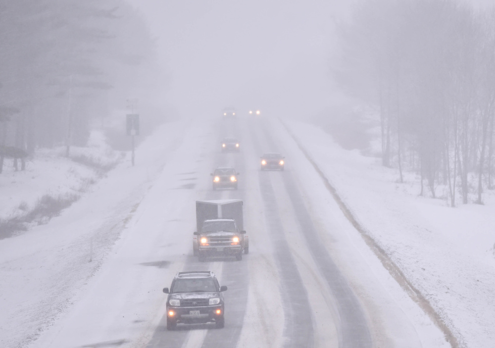 Traffic slows to 45 mph on the north lane of Interstate 95 in Waterville on Thursday as a Nor'easter hits the region.