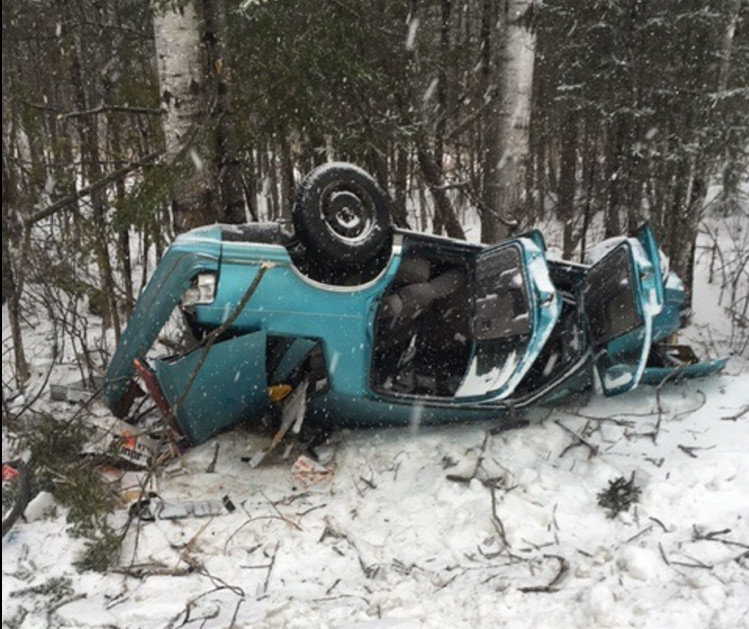 A driver and a passenger in this vehicle were seriously injured Thursday when the car rolled over on Route 27 in New Portland, as seen in this photo provided by the Somerset County Sheriff's Office.