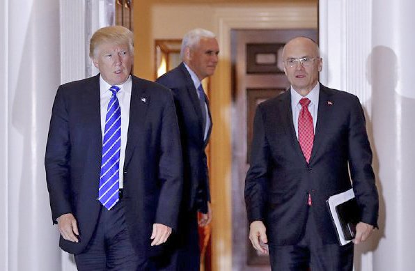 Andy Puzder, right, chief executive of CKE Restaurants, is reported to  be Trump's nominee for secretary of labor. <em>Associated Press/Carolyn Kaster</em>