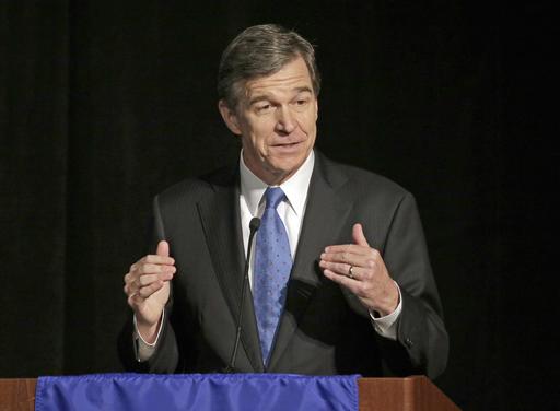 North Carolina Governor-elect Roy Cooper says lawmakers will repeal a contentious bill that has hindered his state's economy.  <em>Associated Press</em>