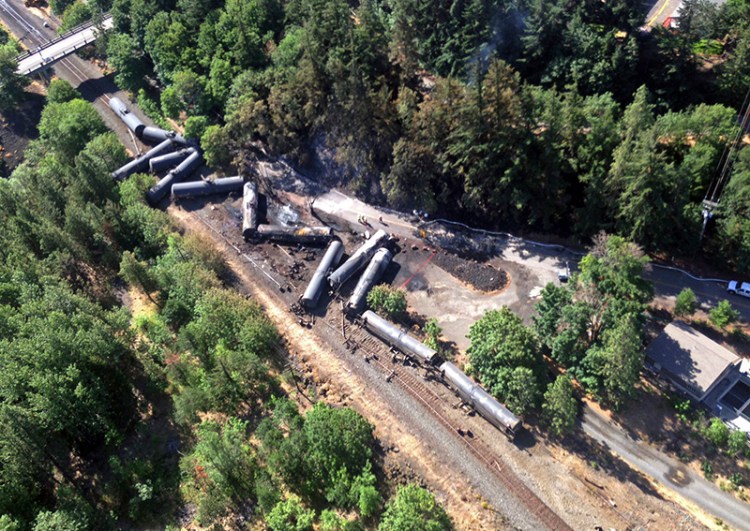 Scattered and burned oil tank cars after a train derailed near Mosier, Ore. in June of 2016.