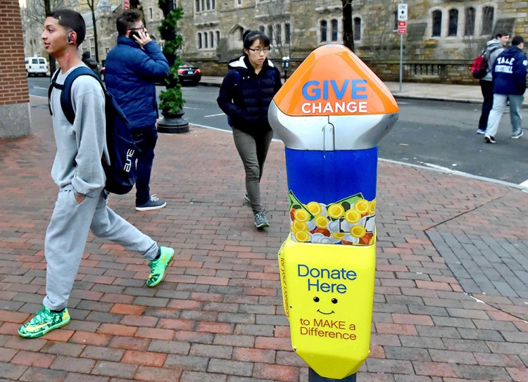 One of four parking-style meters in New Haven, Conn., that are located in areas where panhandling has been prevalent. There are plans to install six more to support local, nonprofit organizations that help the homeless. <em>Peter Hvizdak /New Haven Register via AP</em>