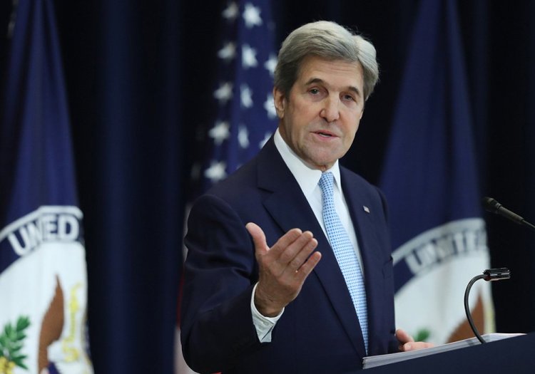 Secretary of State John Kerry speaks about Israeli-Palestinian policy at the State Department on Wednesday. "The vote in the U.N. was about preserving the two-state solution," he said. "That's what we are trying to preserve, for our sake and for theirs."