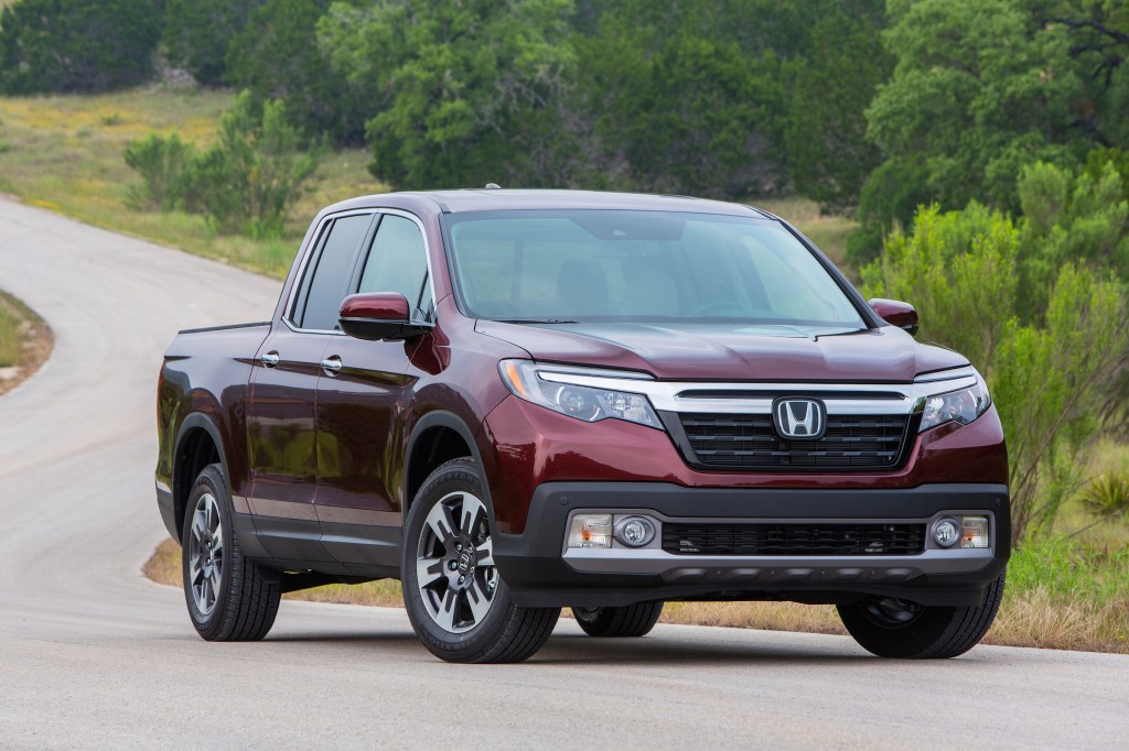 The all-wheel-drive Ridgeline comes with a 2-inch receiver hitch and has a maximum tow rating of 5,000 pounds. The the two-wheel-drive can handle 3,500 pounds.
