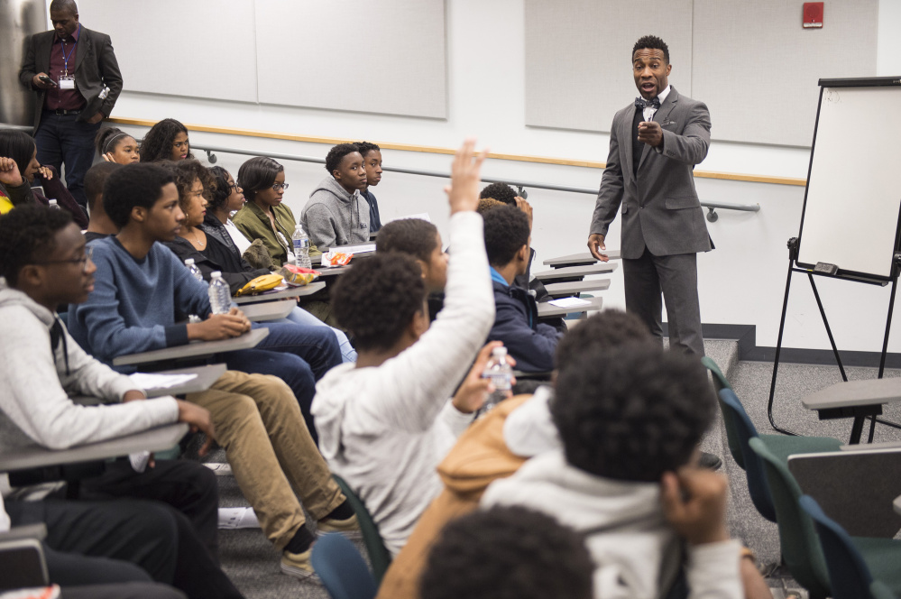 Daon McLarin Johnson, leader of an organization that mentors young men in the Washington, D.C., area, speaks during a "Race and the Law" forum. More than 50 such events are scheduled across the nation in the first three months of 2017.