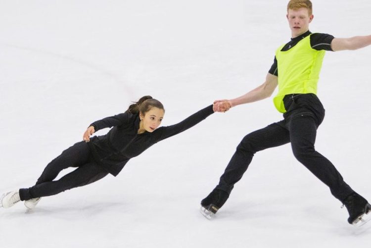 Yarmouth High School sophomore Franz-Peter Jerosch and partner Jade Esposito of Massachusetts practice their pairs figure skating routine at the Family Ice Center in Falmouth.