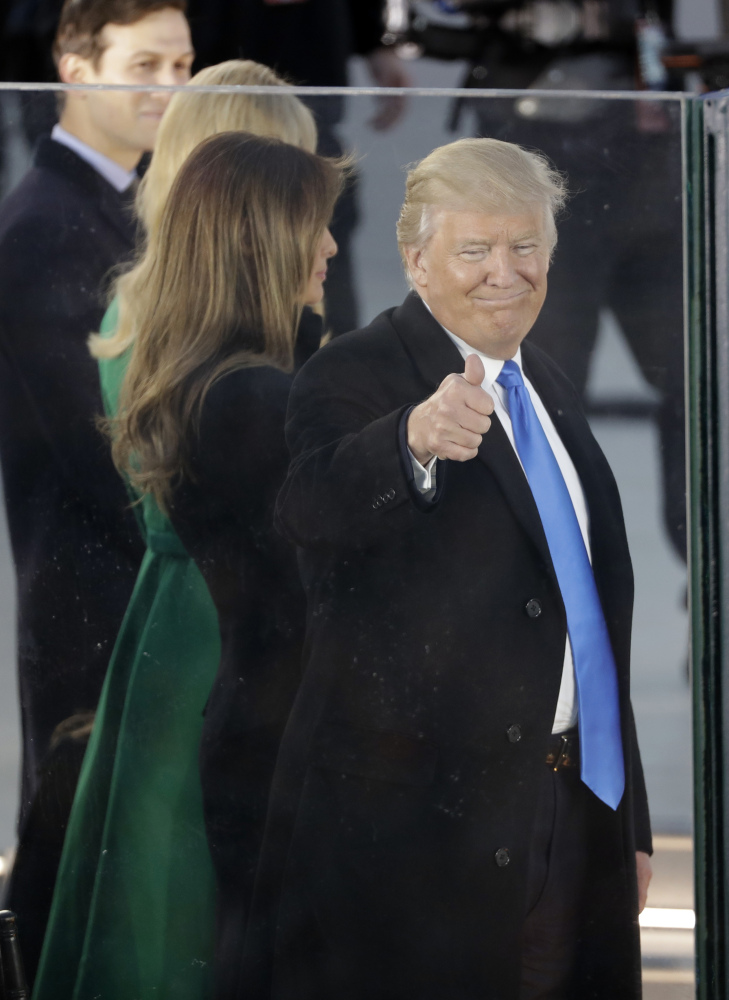 President-elect Donald Trump and his wife Melania Trump appear at a pre-Inaugural "Make America Great Again! Welcome Celebration" at the Lincoln Memorial in Washington, Thursday, Jan. 19, 2017. (AP Photo/David J. Phillip)