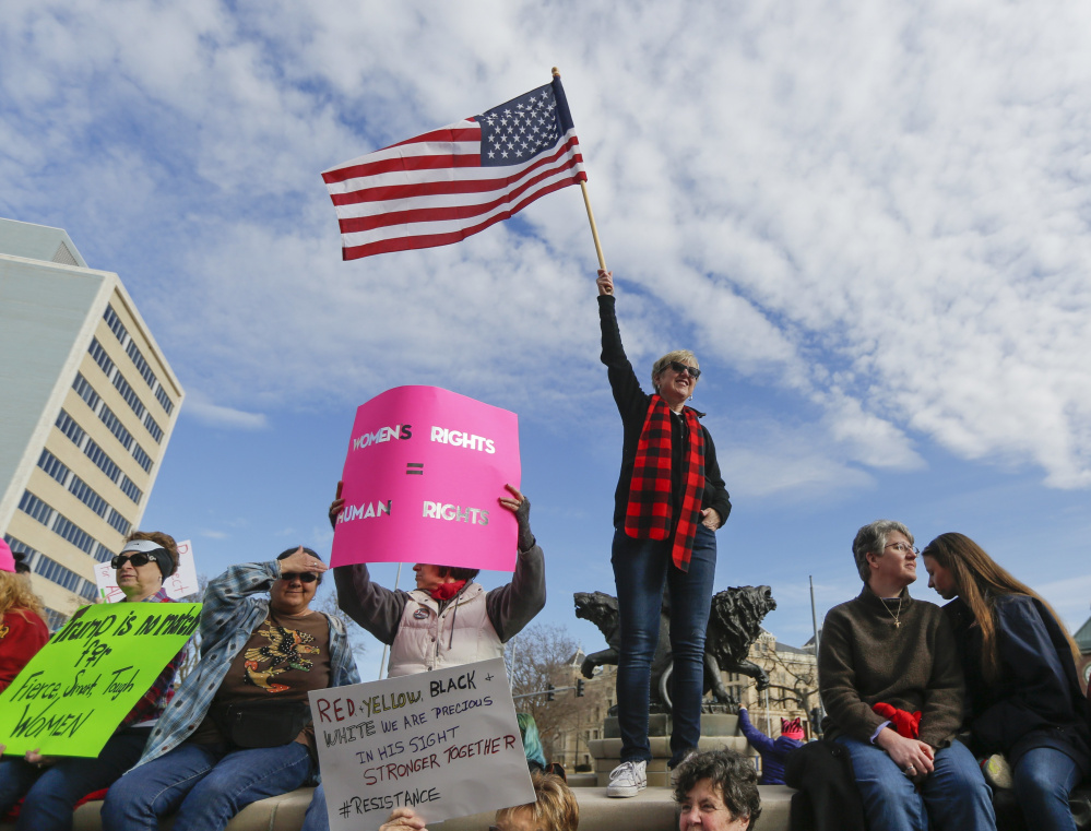 Several thousand people turned out Saturday in Wichita, Kan., which is dominated by Donald Trump supporters, for the local Women's March seeking equal rights for women and protesting Trump, a scene replicated in other small towns.