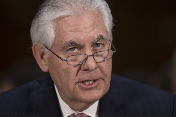 Rex Tillerson testifies on Capitol Hill at his confirmation hearing for Secretary of State in January. New York claims that Exxon has failed to turn over thousands of relevant files, citing the discovery of a alleged Tillerson email account that used an alias.