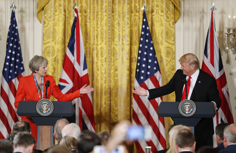 President Trump and British Prime Minister Theresa May appear at a joint news conference in the East Room of the White House in Washington on Friday.