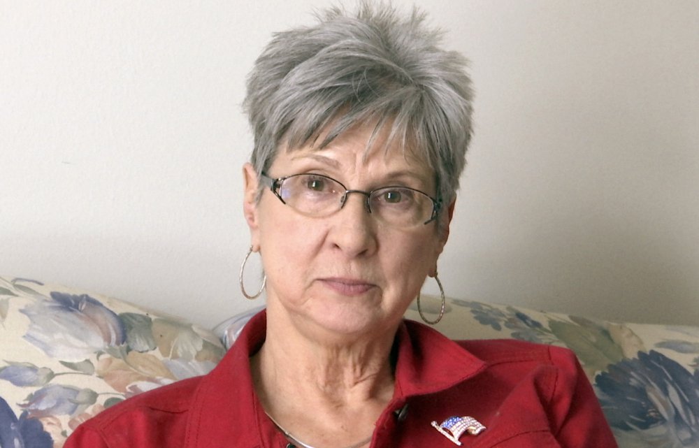 Barbara Van Syckel is interviewed in Sterling Heights, Mich., on Monday. Van Syckel said President Trump is "going to do what he says and says what he does." The 66-year-old says "that's a little frightening for some people."