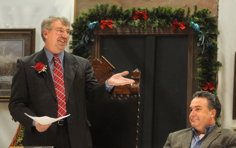 Hallowell City Councilor Alan Stearns, right, listens to Mark Walker's inaugural speech in 2014 after being sworn in as the city's mayor. Stearns opted not to run for re-election and will be replaced on the council by Lynn Irish, while Walker will give another mayoral address Tuesday night.