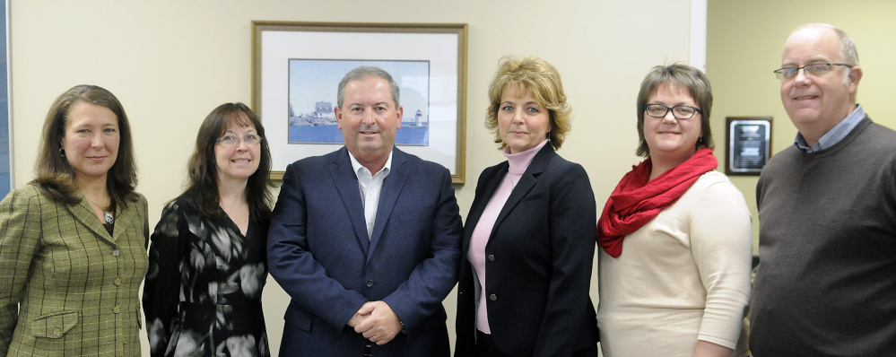 Performance Foodservice — NorthCenter executive team are, from left, Joyce Sawtelle, Vanessa Matthews, President Greg Piper, Bonnie Savage, Michele Pelletier and Jim Mahoney at the firm's office in Augusta on Dec. 20.